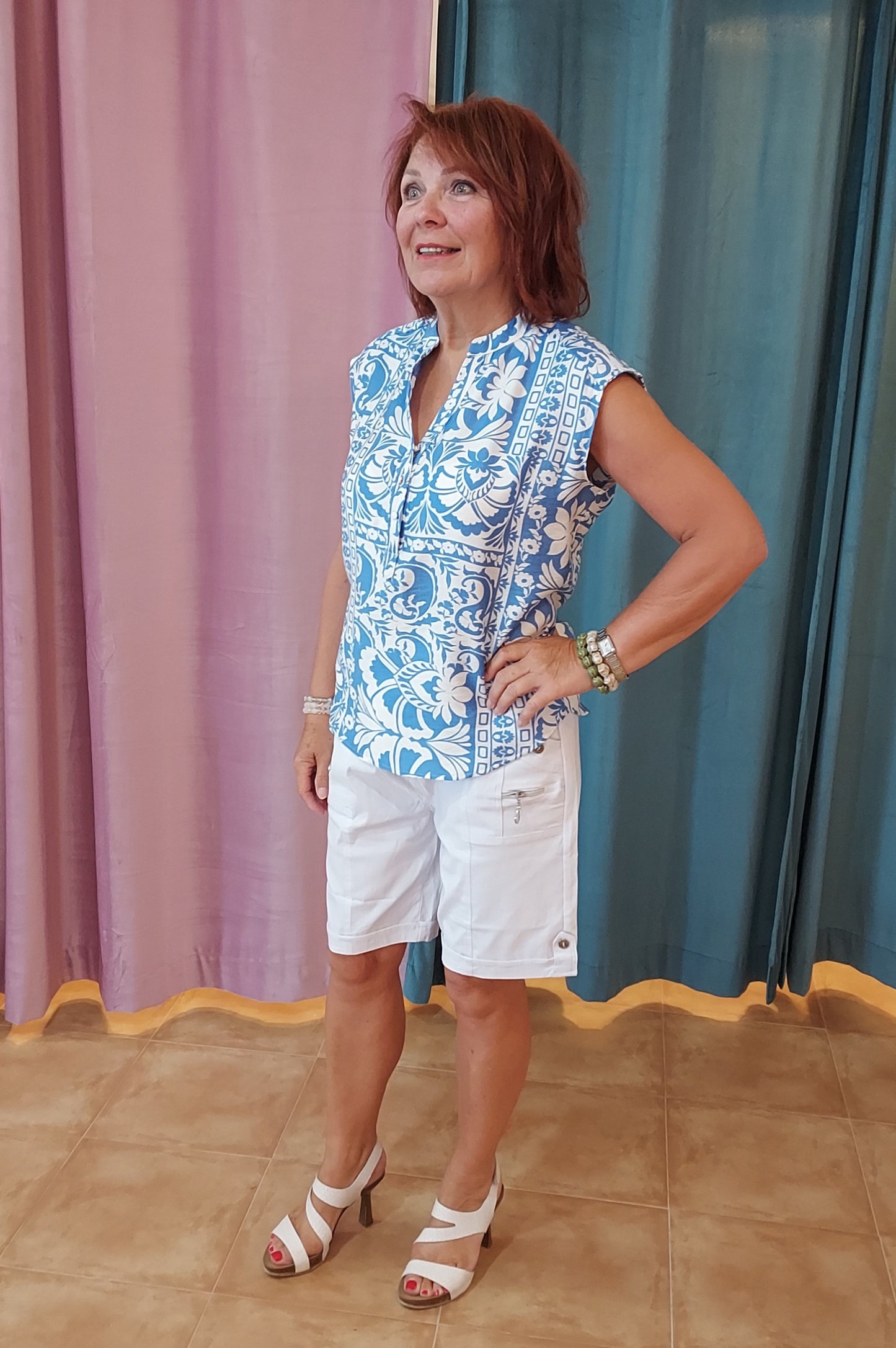 blue and white sleeveless cotton top